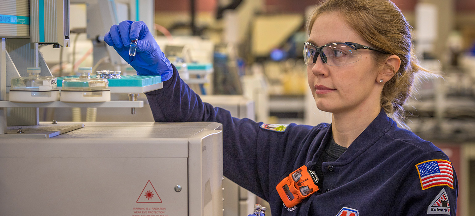 Marathon Petroleum employee working with chemicals in a LAB